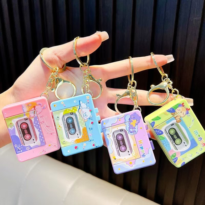 Брелок FG250718033H на сумку, магнітофон 5,5-4-2см, муз., звук,4 види, бат.,пак.