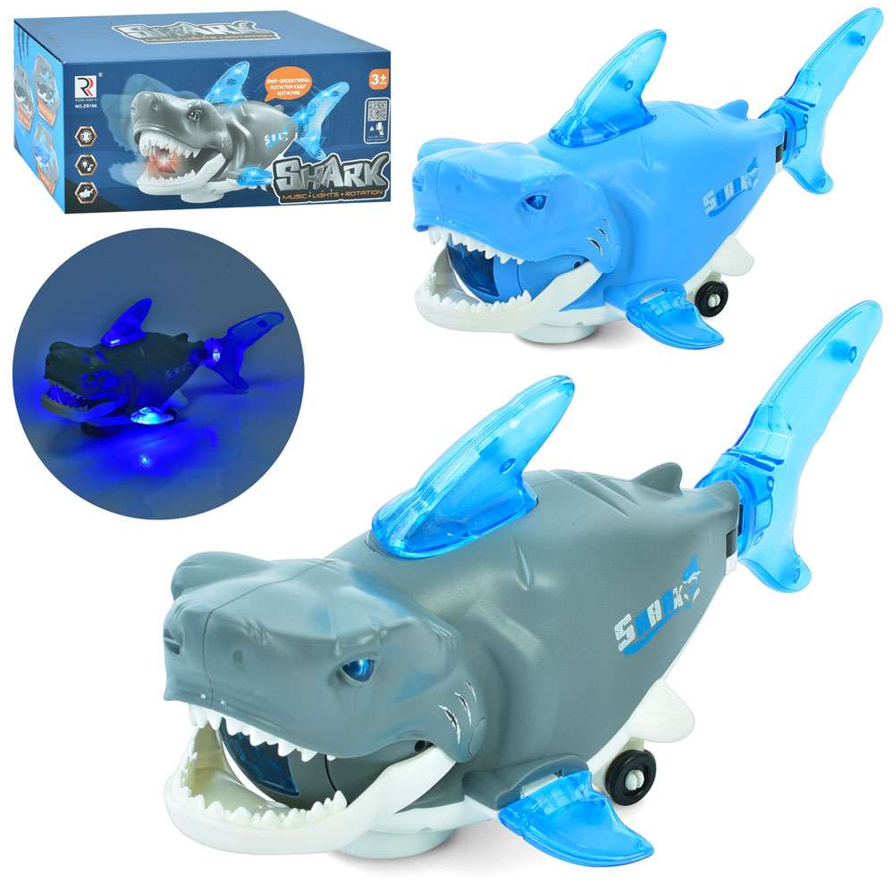 Музична іграшка ZR186 акула, їздить/танцює, 2 кольори, муз., світло, бат., кор., 22,5-10-10,5 см.