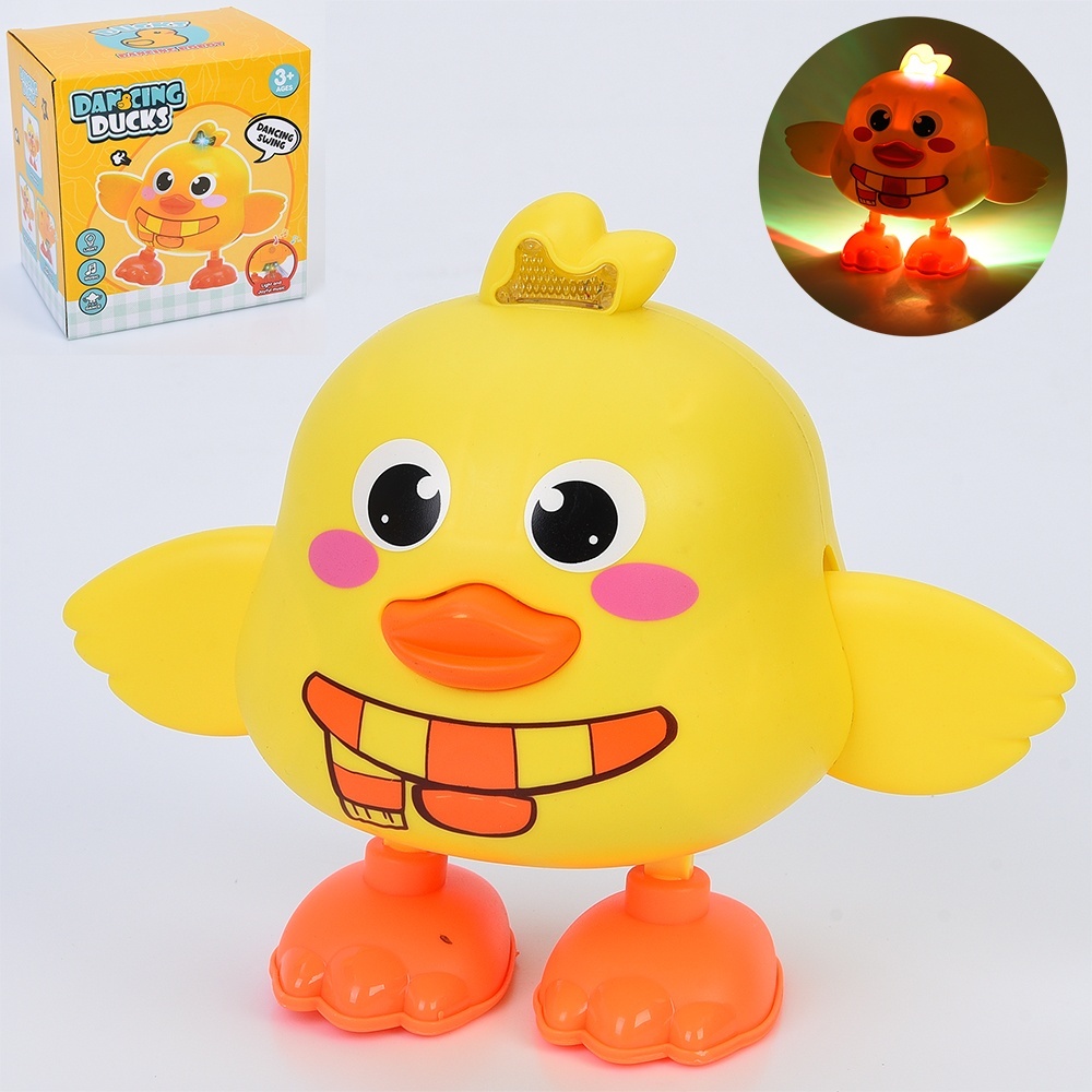 Музична іграшка 9910 каченя, 16см, муз., світло,танцює, бат.,кор., 16,5-16,5-12,5см