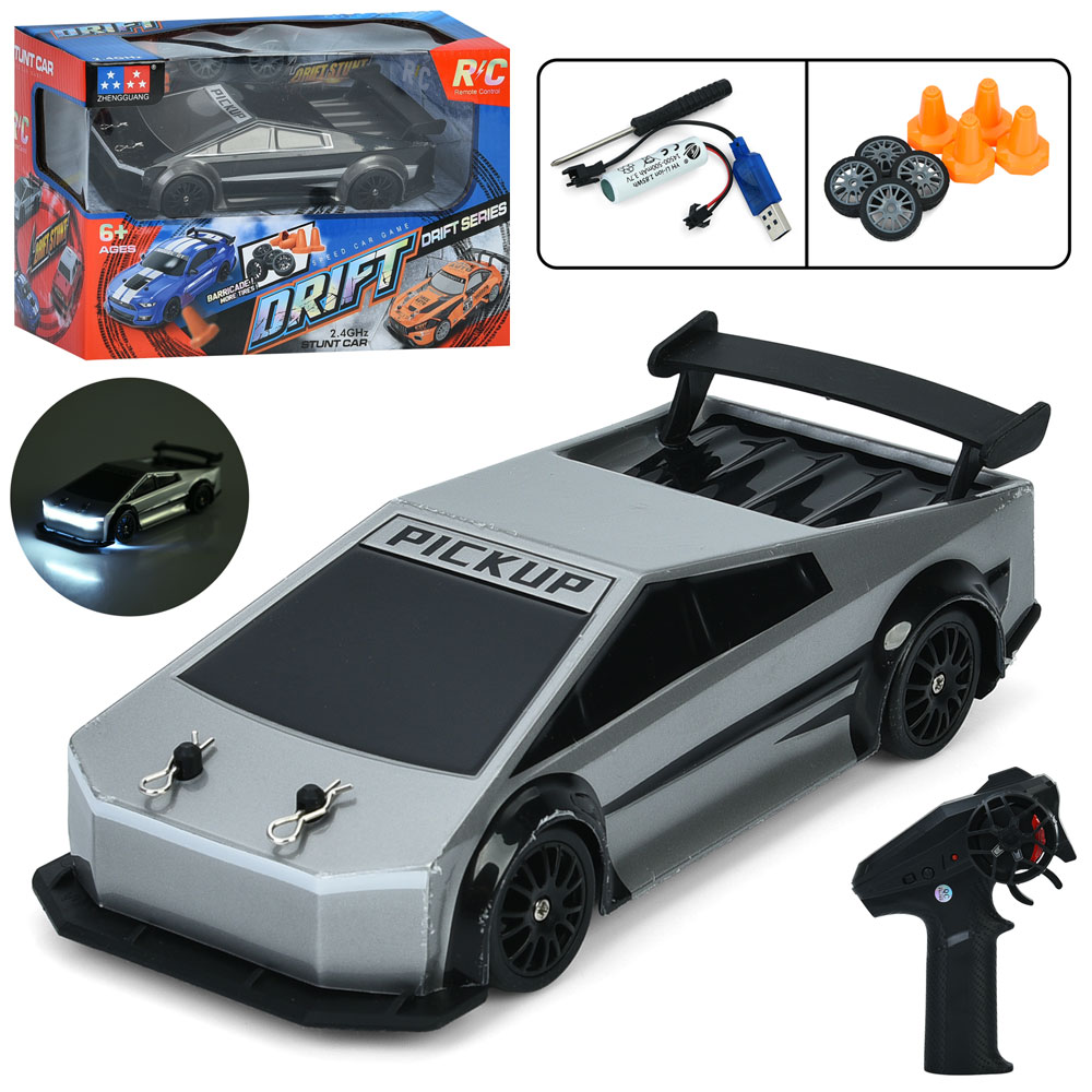 Машина UD3100A радіок.2,4G,акум.,дорож.знаки,дріфт,дод.колеса,USB,2 кольори,світло,кор.,24-16-12,5см