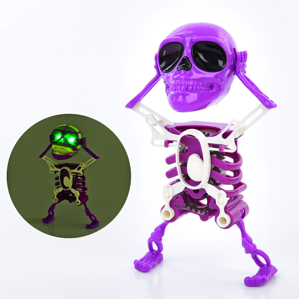 Робот 0822A-2 скелет, заводний, рухливий, муз., світло, бат.(таб.), кул., 13-20-7см.