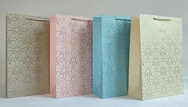 Пакет 20*25*10см паперовий "Золоті квіти" 12 шт в пак. - 1 - smarttoys.com.ua